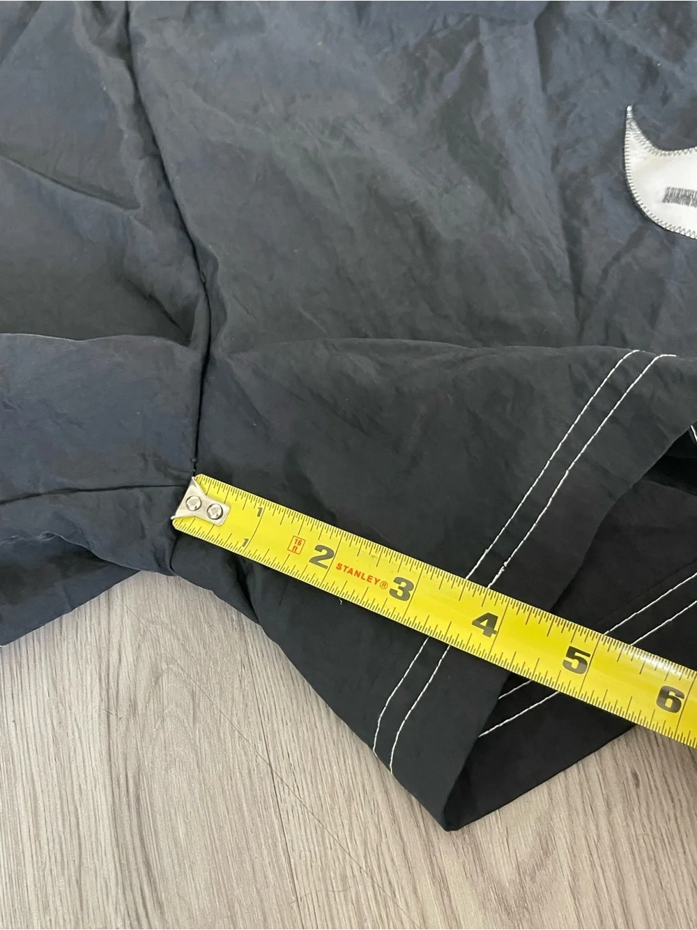 Nike Black Athletic Shorts with White Swoosh Accent